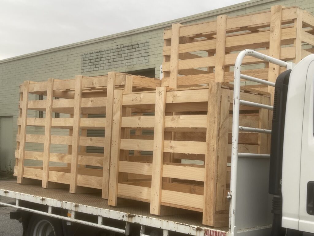 wooden crates on back of a truck