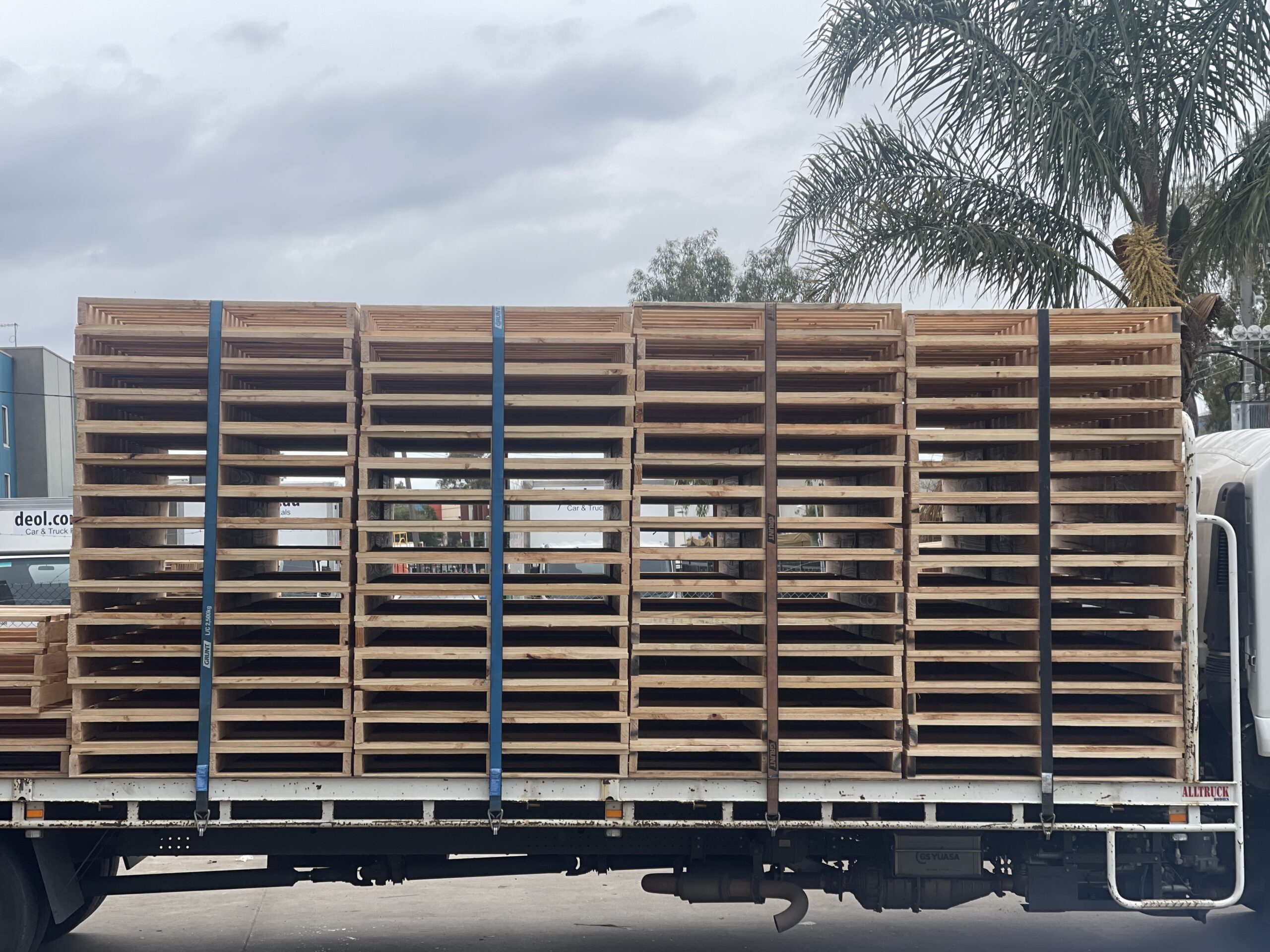 wooden pallets on back of truck outside Crate n Pack Solutions warehouse