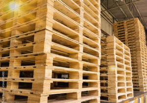 Wooden pallets stack at the freight cargo warehouse for transportation and logistics industrial